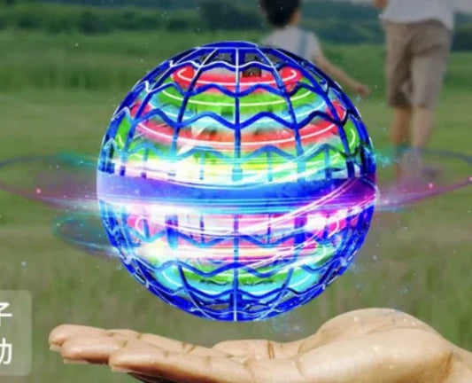 Orbe volant LED lumineux en vol au-dessus d'une main